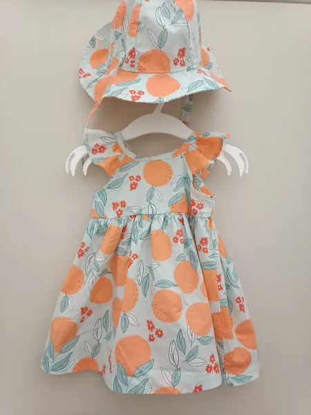 Vestido con Olanes y Gorro de Sol